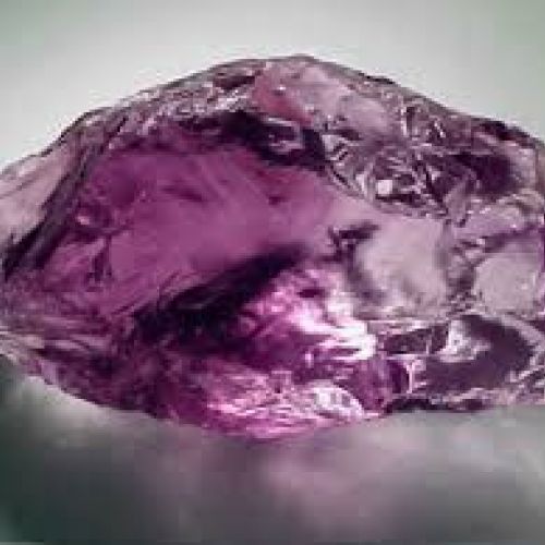 Raw amethyst, one of the healing crystals one can use to lessen the effects of Mercury Retrograde 